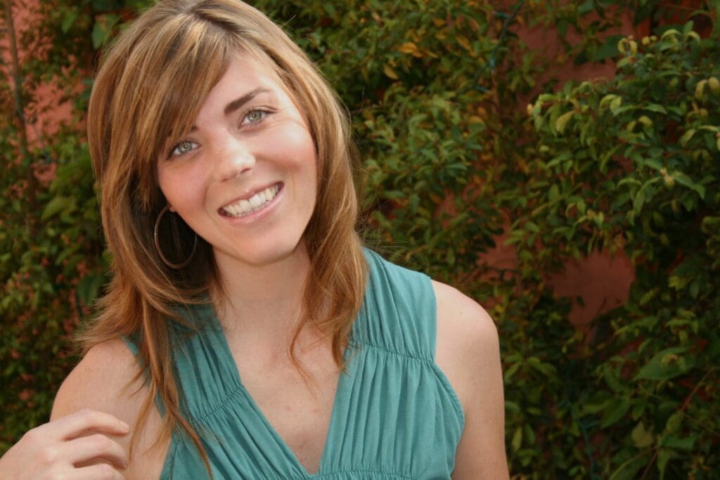 A woman wearing a blue dress.