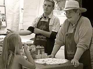 A woman wearing an apron.