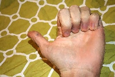 A hand giving a thumbs up.