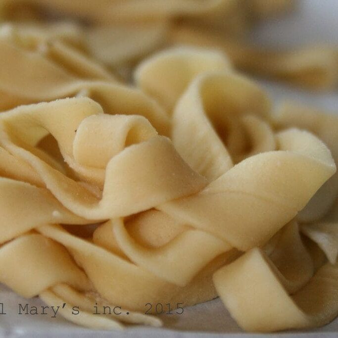 A pile of noodles on a piece of paper.