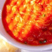 a bowl of Tomato and rice soup